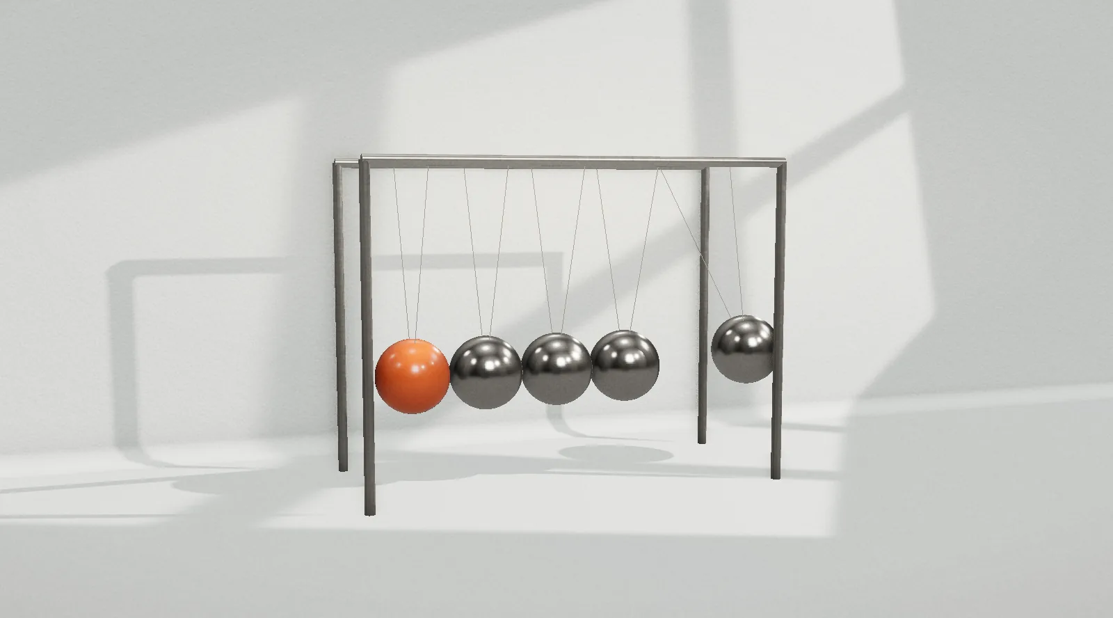 A cradle of spheres, one orange, in a misty room