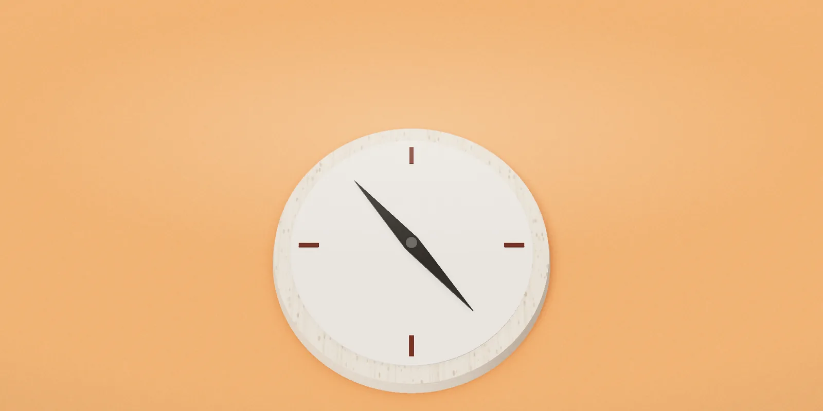 A compass on an orange table, the needle settled