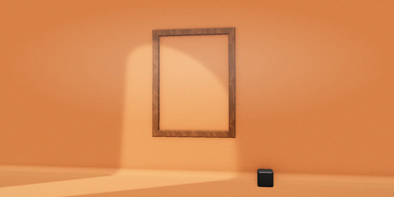 An empty wooden frame on an orange wall