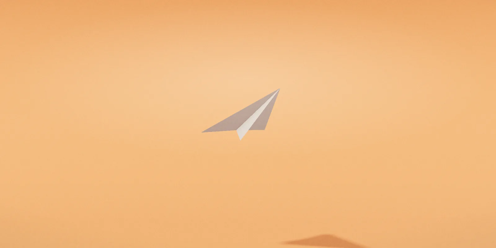 A white paper plane in an orange sky